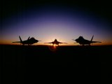 Raptor fighter planes sunset USA air force.jpg